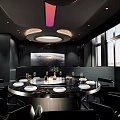 Modern Private Box Interior Design With Black Seats Tables And Rainbow Lighting