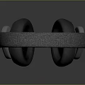 Sleek Modern Electronic Over Ear Headphones With Soft Black Ear Cushions And Textured Headband