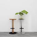 Stylish Wooden And Metal Bar Stools With Green Plant Vase Against White Wall Gray Floor