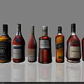 Assorted Whiskey Bottles and Elegant Glasses Arranged in a Row on White Surface