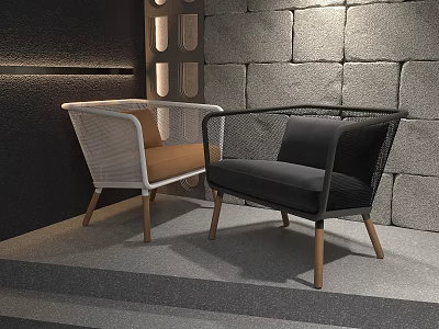 Two Modern Single Armchairs With Woven Design Wooden Legs And Stone Wall Backdrop 3d model