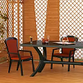 Outdoor Wooden Gazebo With Blue Roof Green Plants Around Table Chairs