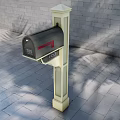 Commercial Mailbox With Beige Post Black Compartment And Number 789 Against Gray Brick Wall