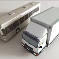 Silver Public Bus And White Cargo Truck Parked Side By Side For Vehicle Showcase