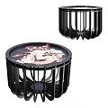 Modern Side Table With Round Glass Top Black Metal Frame And Floral Pattern Design