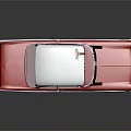 Vintage Red Classic Car With White Roof And Chrome Accents On Black Surface