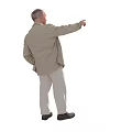 Mature Man Standing Pointing With Right Hand Wearing Beige Jacket White Pants And Black Shoes