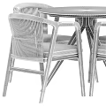 Modern Round Wooden Table With Four Woven Back Chairs And Gray Cushions Metal Legs
