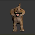 Brown Elephant Toy With Raised Trunk And Yellow Object In Mouth On Black Background