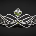 Elegant Silver Tiara Featuring Curved Design Floral Motif And Green Gemstone Inlaid