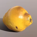 Ripe Shiny Yellow Fruit With Natural Dark Spots On Gray Background