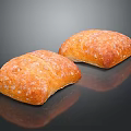 Freshly Baked Golden Brown Bread Loaves With Crispy Crust On Dark Surface
