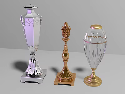 Three Different Designed Trophies With Silver Gold Transparent Bodies And Decorative Bases 3d model