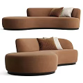 Brown Curved Sectional Sofa With Textured And White Decorative Pillows