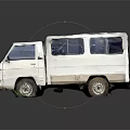 Small White Mini Van Featuring Covered Roof Windows And Side View Exterior