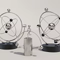 Modern Metallic Decorative Ornament Set With Spherical Design Circular Rings Cylindrical Accent And Black Bases