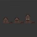Three Small Wooden Buildings With Red Roofs And Surrounding Wooden Fences