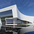 Modern Building With Curved White Facade Large Glass Windows Circular Pool Reflection And Blue Sky