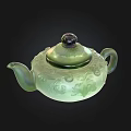Elegant Green Ceramic Teapot With Intricate Carved Patterns And Classic Design 3d model