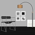 Modern Lounge Chair With Metal Frame Arched Floor Lamp Wall Art Prints And Open Book