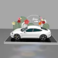 Floral Display with Decorative Flowers and White Car on Spray Platform