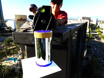 Silver Metal Cup With Purple Rim And Gold Decoration On White Platform Rooftop City View 3d model
