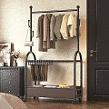 Modern Black Metal Clothes Rack Design With Hanging Sweaters Shirts And Handbag For Home Bedroom