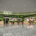 Modern Food Service Kitchen with Green Accents Multiple Counters and Food Display Areas