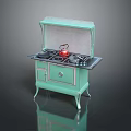 Vintage Green Kitchen Stove with Four Burners Red Kettle Cabinet Doors and Drawer
