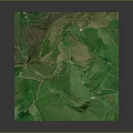 Aerial View Of Scenic Green Mountain Landscape With Rolling Hills And Natural Paths