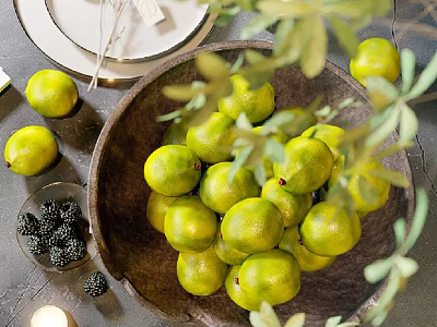 Fresh Decorative Arrangement With Limes In Wooden Bowl Blackberries Candle And Green Leaves 3d model