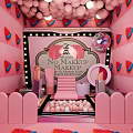 Pink Themed Instagrammable Photo Spot with Hanging Balloons Watermelon Decorations Makeup Products and Disco Ball