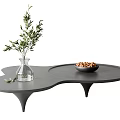 Modern Stylish Coffee Table With Irregular Shape Decorative Glass Vase Olive Branches And Nut Bowl