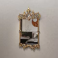 Ornate Golden Framed Mirror Reflecting Bedroom Bed With Pillows And Blanket
