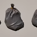 Three Gray Plastic Bags With Tied Tops For Home Waste Storage