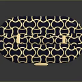 Stylish Navy Blue Ottoman with Gold Geometric Pattern and Gold Handles