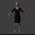 Woman with long blonde hair wearing dark blue V neck shirt against gray background