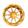 Golden Car Wheel With Intricate Spoke Design And Shiny Metallic Finish For Luxury Vehicles