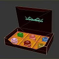 Open Red Box of Swiss Cafe Chocolates Arranged Neatly with Golden Lining and Cream Topping