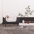 Modern White Single Sofa With Wooden Legs And Green Plant By Fireplace