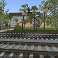 Rail Tracks As Road Infrastructure With Gravel Palm Trees Building And Greenery
