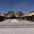 Traditional Thatched Roof Buildings With Stone Paved Courtyard And Purple Trees