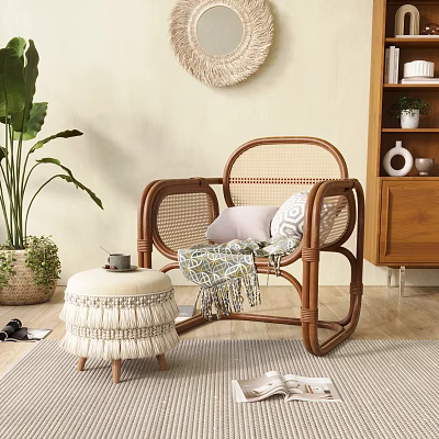 Cozy Rattan Leisure Chair with Pillow and Blanket Near Green Plant and Wooden Ottoman 3d model
