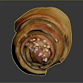 Swirled Cinnamon Roll With Golden Brown Surface And White Sugar Sprinkles