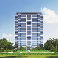Modern High Rise Residential Building With Glass Windows Green Lawns And Trees