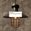 Industrial Style Metal Pendant Light With Cage Shade And Lit Bulb Against Rough Textured Wall