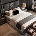 Double Bed With Black Leather Headboard White Bedding Pillows Nightstands Lamp And Brown Bench