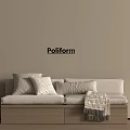 Poliform Banquette Sofa With Decorative Pillows And Blanket In Beige Wall Interior