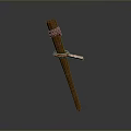 Brown Wooden Stick With Red Strap Tied Around Middle Section