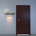 Home Interior With Dark Wooden Door And Illuminated Wall Sign Design